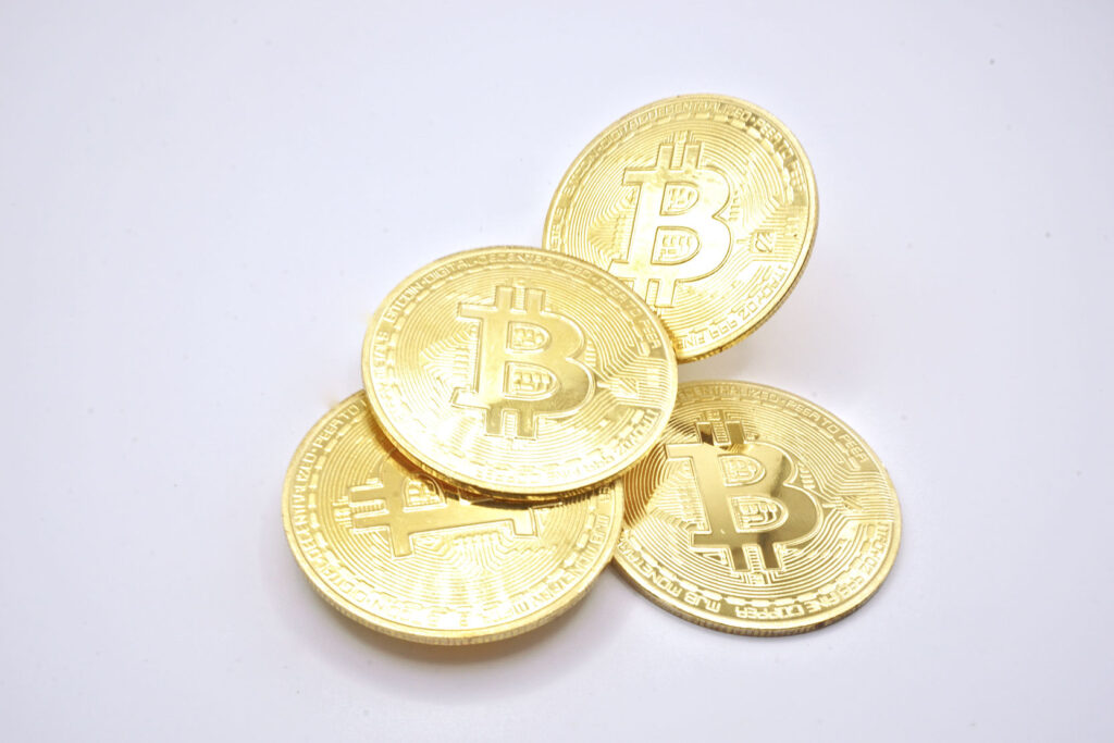 Four Stacked Gold Bitcoin ($BTC) Tokens Ⓒ 2023 – Crypto Coin Opps