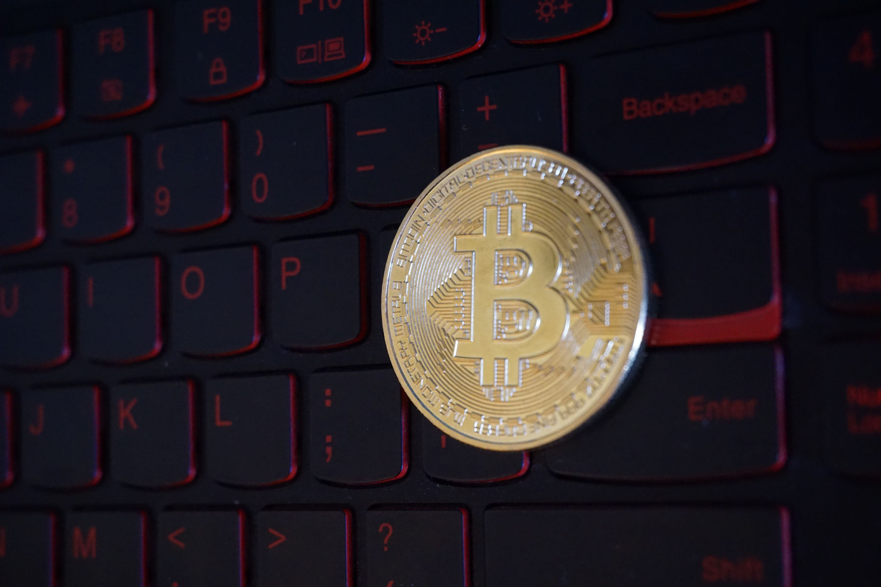 Bitcoin [$BTC] Token on Laptop Keyboard Ⓒ 2023 – Crypto Coin Opps