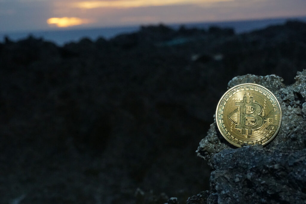 Bitcoin in Front of Sunset Ⓒ 2023 – Crypto Coin Opps
