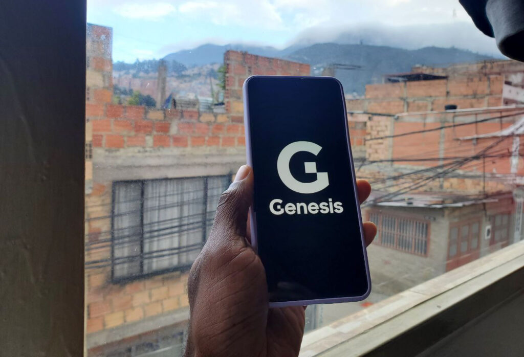 Crypto Lender Genesis' Smartphone Screensaver in Front of Bogota, Colombia Skyline Ⓒ 2023 – Crypto Coin Opps