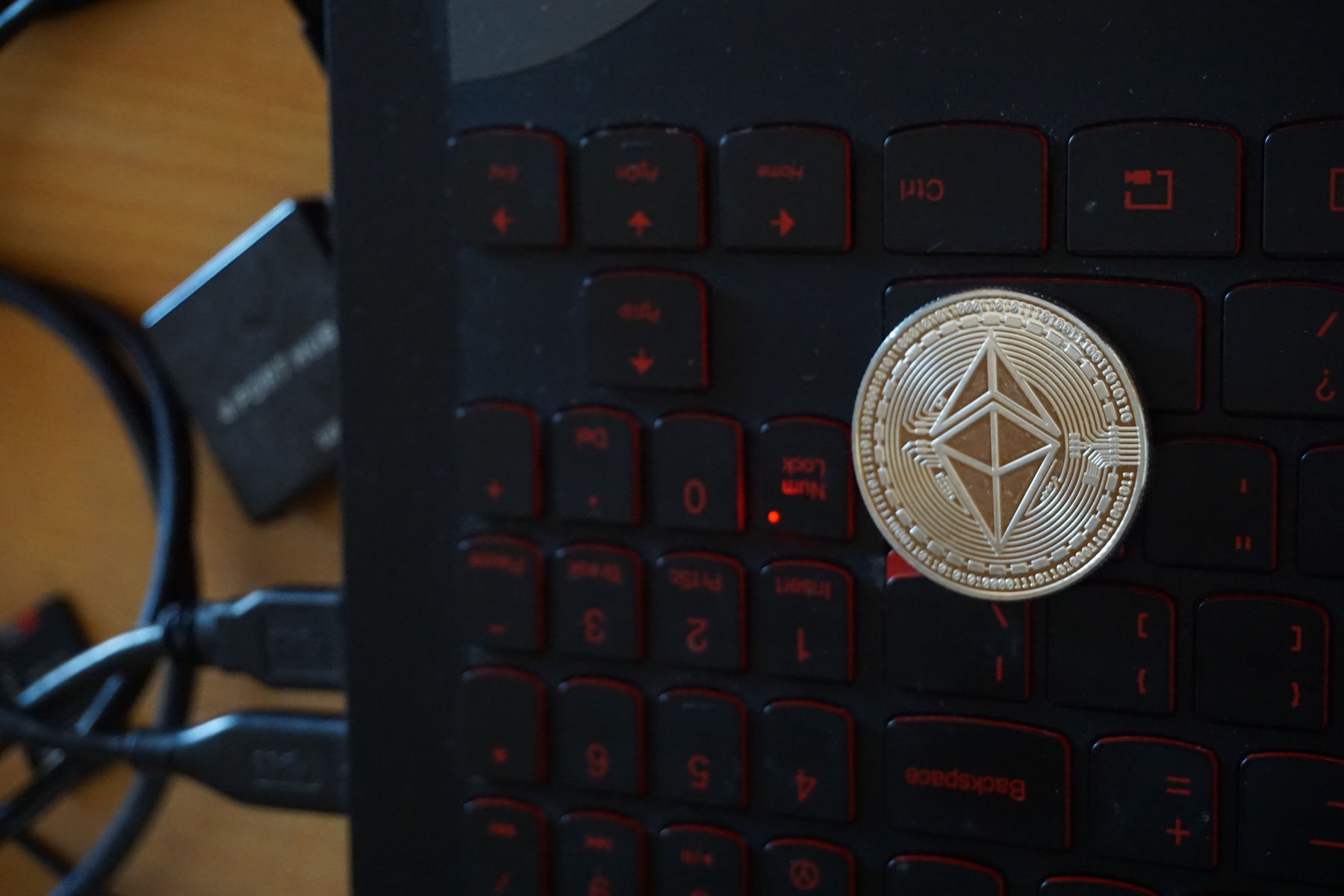 Ethereum [$ETH] Token on Laptop Keyboard Ⓒ 2023 – Crypto Coin Opps