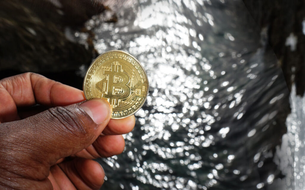 Warped Hand Holding Bitcoin Photo Ⓒ 2023 – Crypto Coin Opps