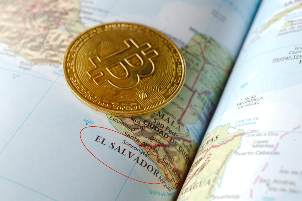Bitcoin [$BTC] token atop a map of El Salvador Ⓒ 2023 – Crypto Coin Opps