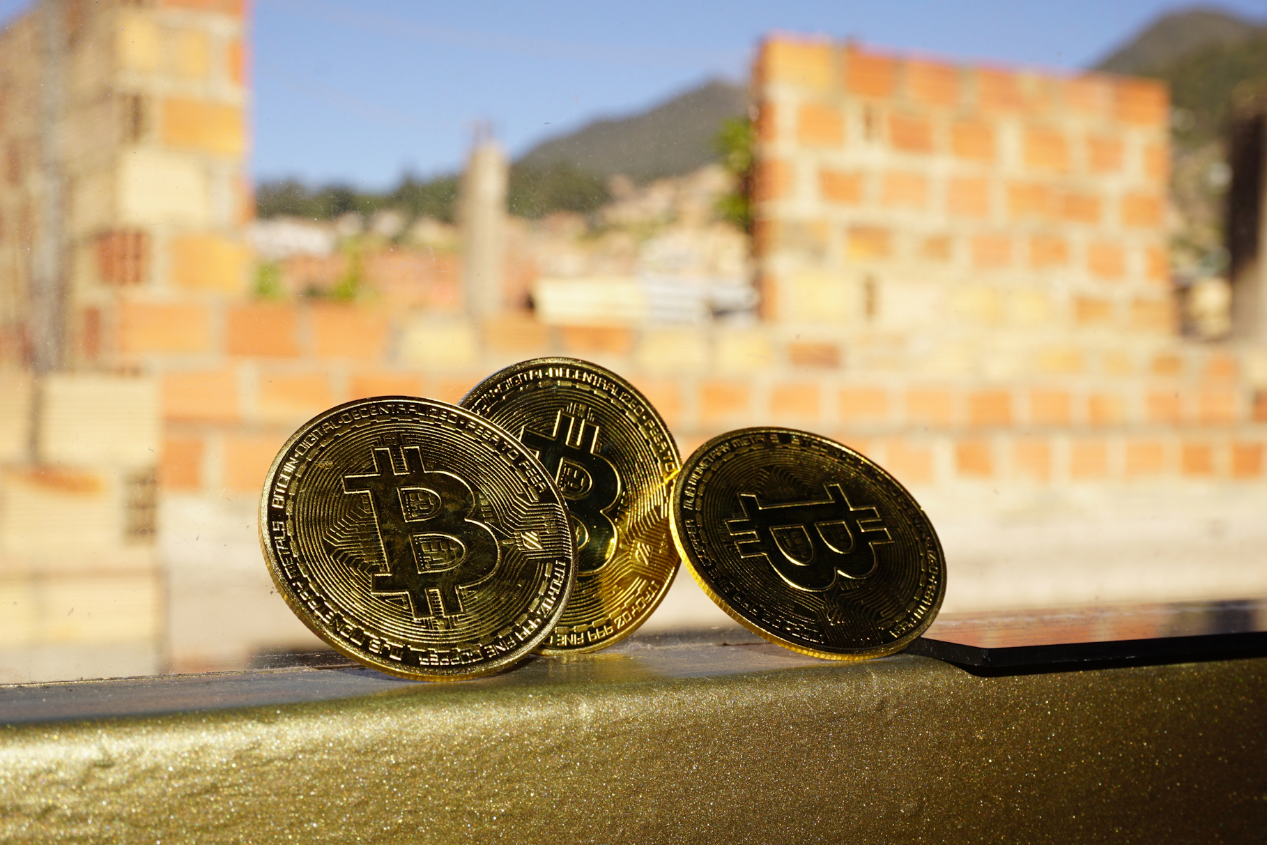 Bitcoins on Bogota, Colombia Window Sill Ⓒ 2023 – Crypto Coin Opps